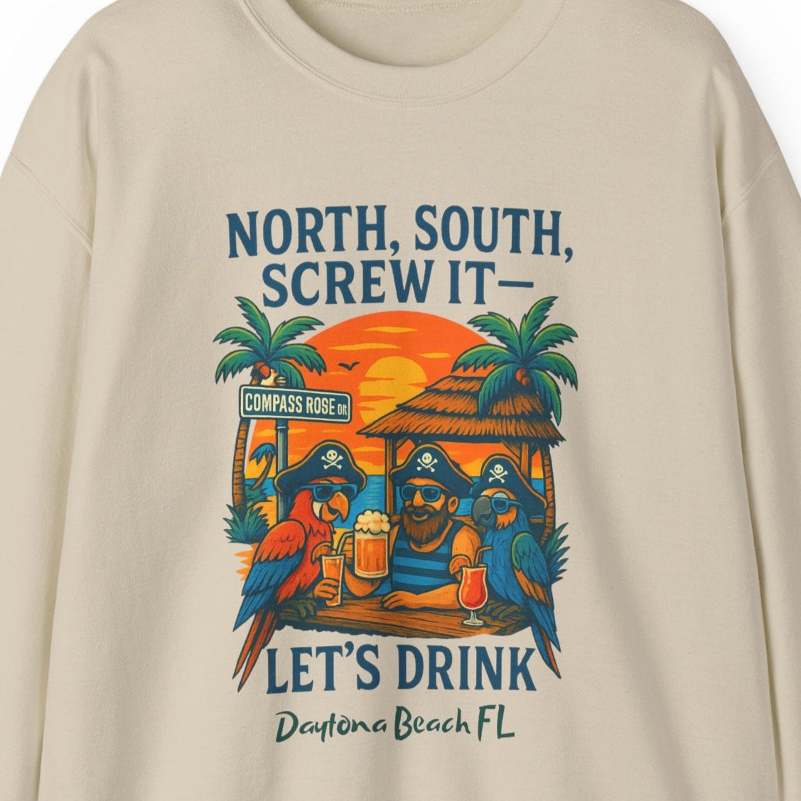 Beige sweatshirt with a tropical graphic and text on a white background