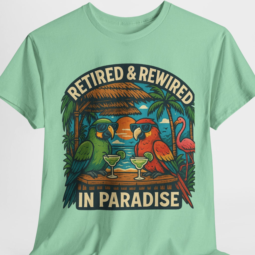 Mint green t-shirt with tropical graphic and text 'Retired & Rewired in Paradise' on a white background