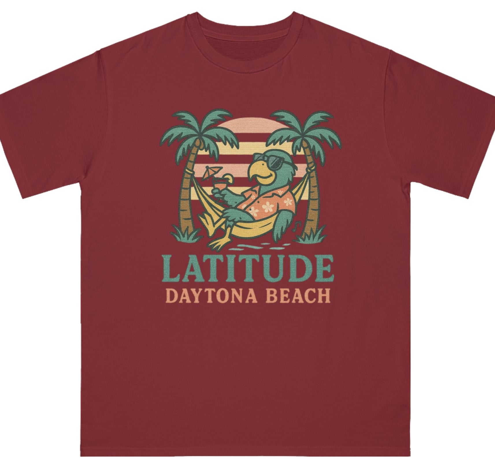 Maroon t-shirt with a graphic of a pelican in a hammock between palm trees and 'Latitude Daytona Beach' text.