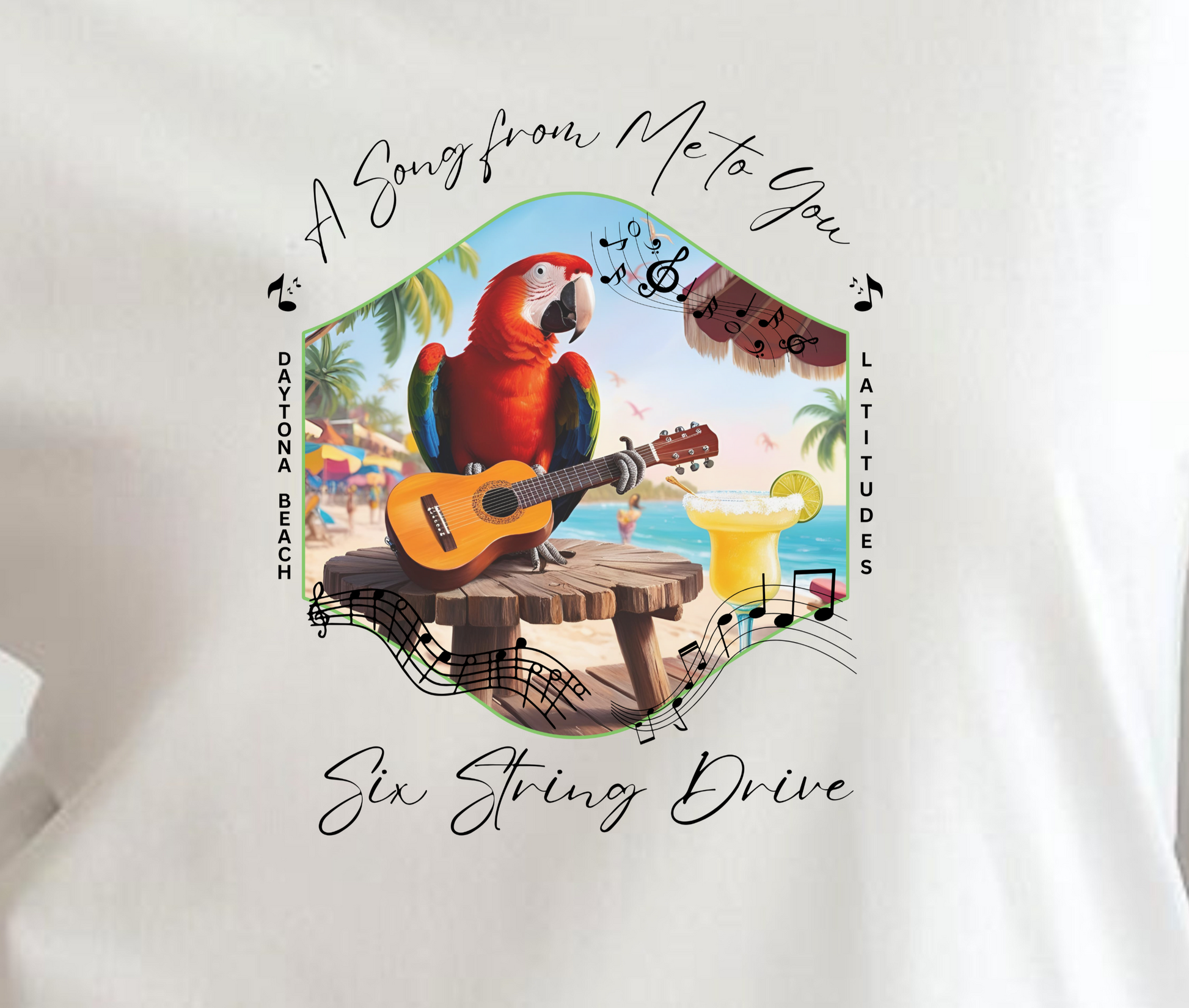 White t-shirt with a colorful graphic of a parrot, guitar, and tropical scene on a plain background.