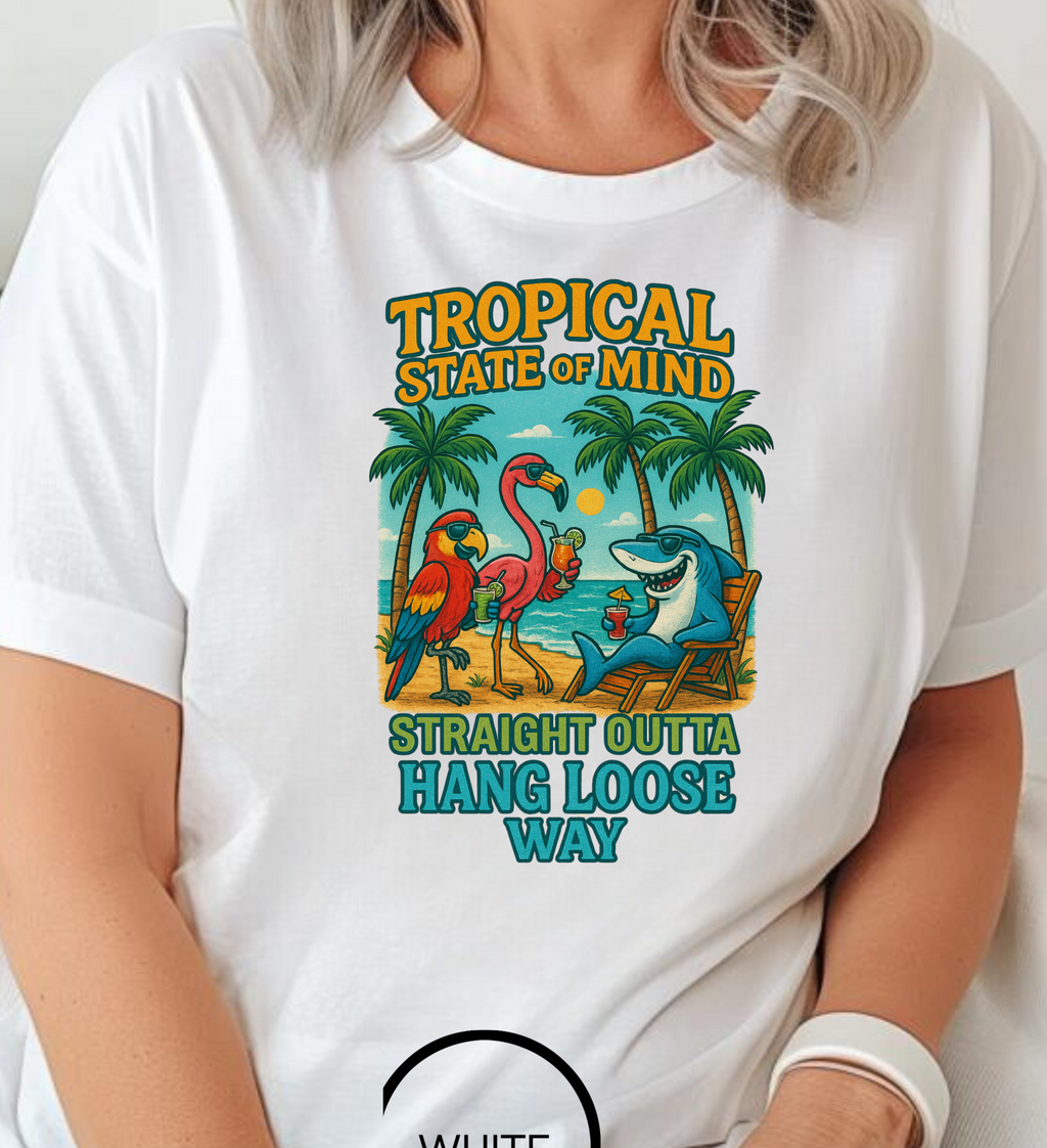 Person wearing a white t-shirt with a colorful graphic and text.