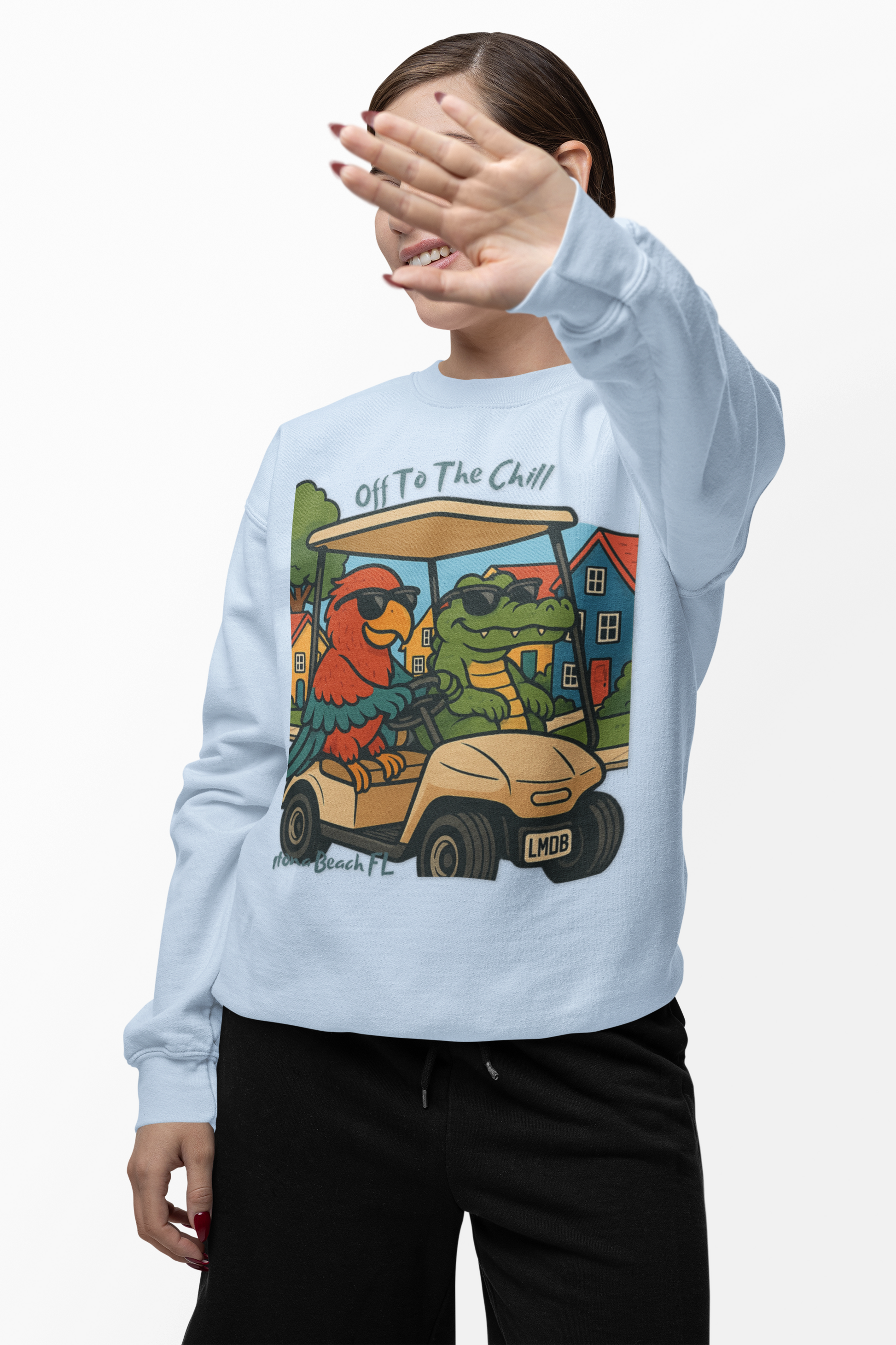 Person wearing a light blue sweatshirt with a colorful graphic design on a white background