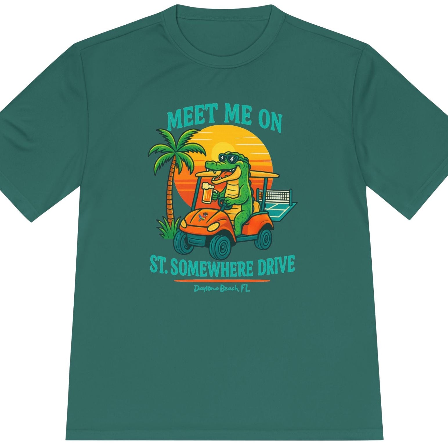 Green t-shirt with a graphic of a crocodile on a golf cart and palm trees, with text 'Meet Me on St. Somewhere Drive'.