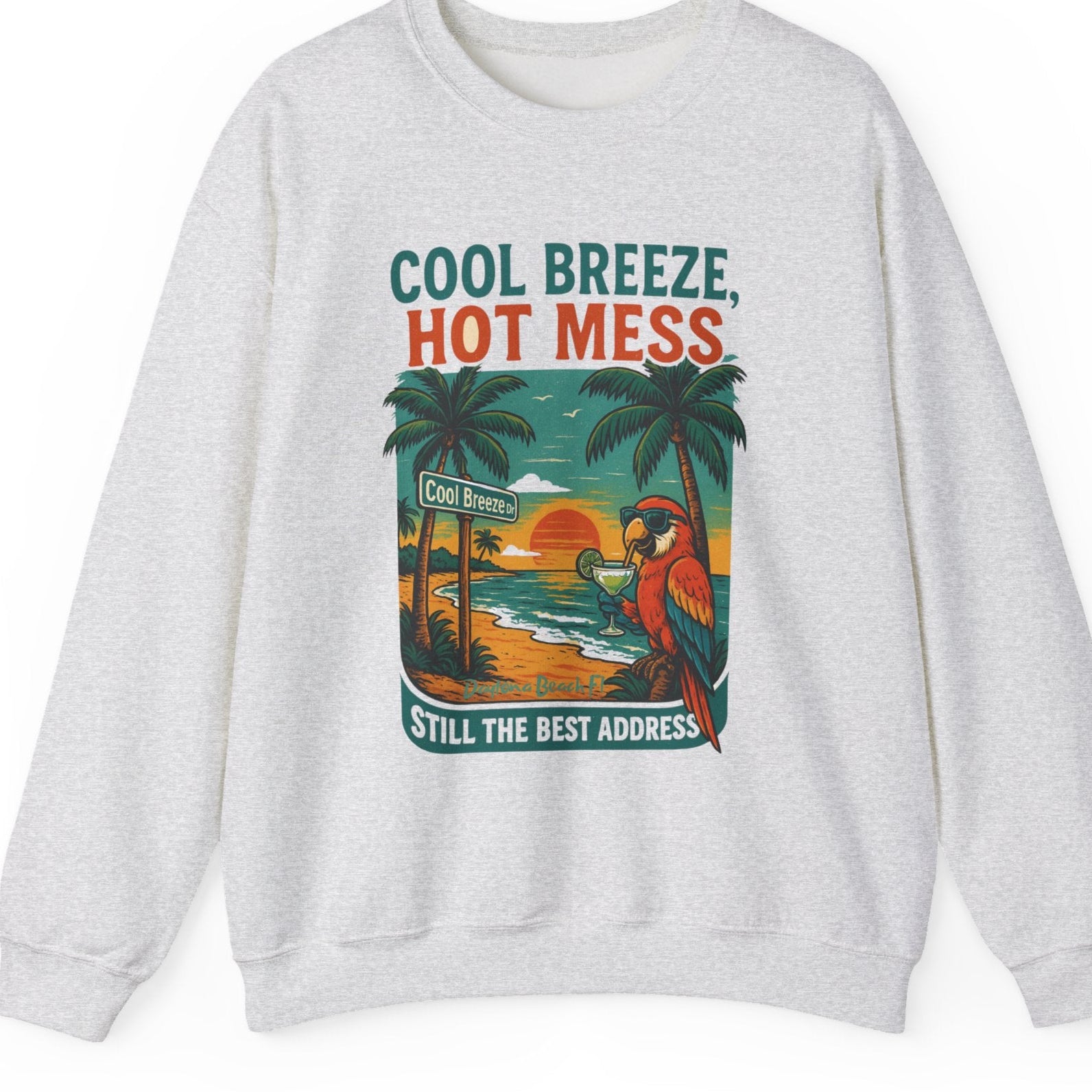 Gray sweatshirt with a tropical graphic and text on a white background